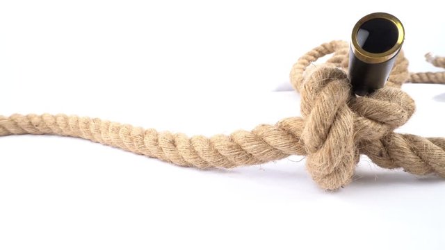 Strong Rope with a Knot and Telescope isolated on white Background