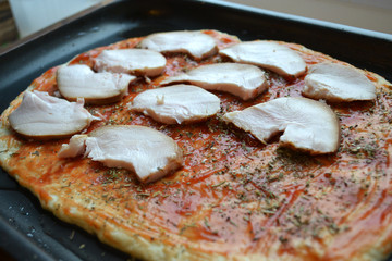 Cooking Pizza with Cheese and Chicken