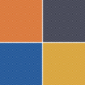 Set of 4 seamless geometric background patterns with textured diamond shapes in orange, classic blue, gray and mustard yellow. For wallpaper, wrapping paper, textiles, home decor.