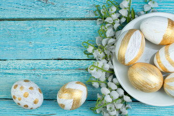 Happy Easter. eggs isolated on wooden table background.. Balls, wreath woven from the vines. Copy space for text. Top view.