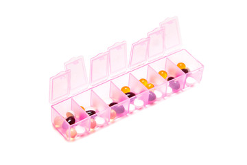 Container for tablets for every day on a white background