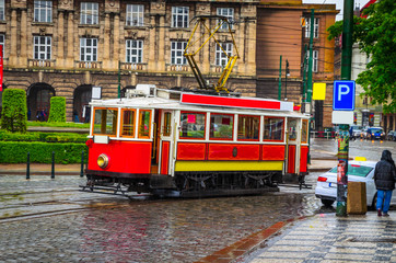 Fototapeta na wymiar Vintage tram in old street of Prague, Czech Republic.