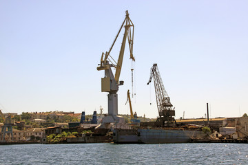 Fototapeta na wymiar Loading seaport in on the sea coast