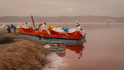 Abandoned pedal boats by Maharloo pink lake, Shiraz, Iran