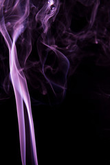 Violet smoke on black background
