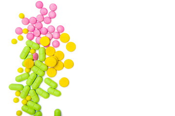 ndful of tablets and pills in hand isolated on white