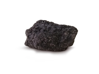 Lignite coal on white background. Lignite is a soft, brown, combustible, sedimentary rock formed from naturally compressed peat. There is noise and grain caused by the texture of the coal.