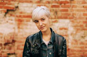 casual portrait of beautifu blond young woman outdoors