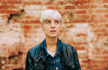 casual portrait of beautifu blond young woman outdoors