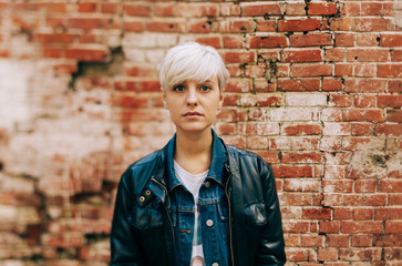 casual portrait of beautifu blond young woman outdoors