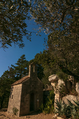 Obraz premium small chapel at the Benedictine Monastery on St. Mary Island at the Veliko Jezero, large lake, Mljet National Park, Mljet Island, Dubrovnik-Neretva, Dalmatia, Croatia