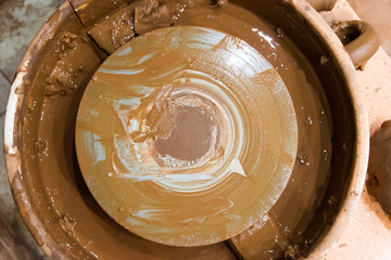 An empty circle where the Potter sculpts the product. Workplace of the master of pottery.