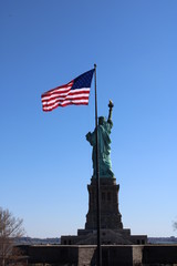 American Flag and Statue of Liberty on Liberty Island New York City