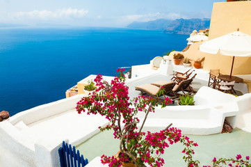 White architecture and blue sea on Santorini island, Greece. Beautiful terrace with sea view.