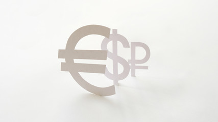 Obraz premium Badges of the currency, cut out of paper. The concept of devaluation of the ruble.