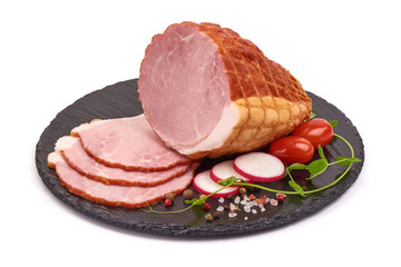 Smoked pork ham on a stone plate, isolated on white background