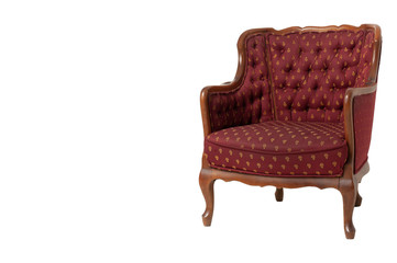 Royal red textile armchair in a classic style. Retro. Antiques. Isolate