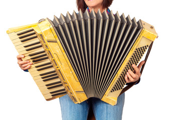 Woman playing traditional accordion isolated on white.