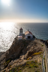 Fototapeta na wymiar Lighthouse by the Coast in California, Point Reyes lighthouse, Pacific coast, National Park