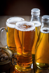 Light beer in a glass on the table