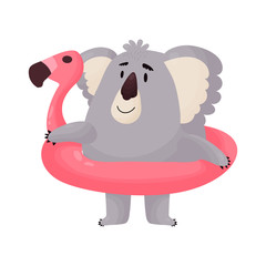 Cute Koala goes swimming in the sea with a rubber circle.