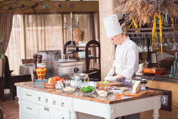 chef cooks spaghetti in a premium restaurant.