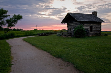 Fototapeta na wymiar The historic Cragg Cabin at sunset, Goose Lake Prairie State Park, Grundy County, IL.