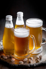 Light beer in a glass on the table