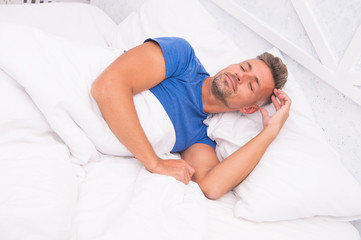 Sleeping handsome. Bearded man sleeping face relaxing on pillow. Handsome and sleepy. Sexy man sleeping in bed. Guy lying in bed try to relax and fall sleep. Enjoying beautiful morning