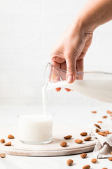 Almond milk.Drink for vegetarians.Dairy free milk substitute beverage.