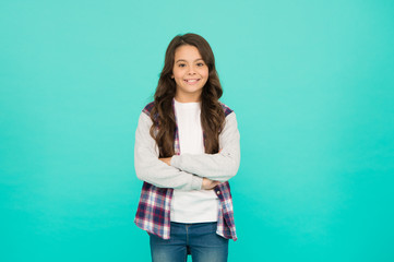 Confident beauty. little beauty. express positive emotions. happy small girl turquoise wall....