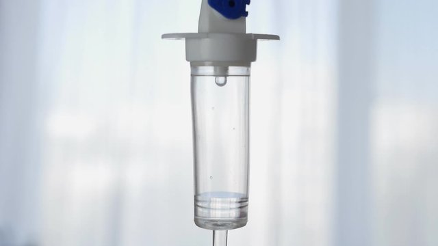 Slow Motion with Liquid Drug That Drips into Medical Perfusion for Intravenous Treatment