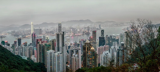 China, Hong Kong, 02/15/2016. Panorama view of the city from Victoria Peak. Beauty, view, overcast