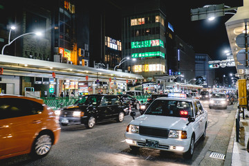 Fototapeta na wymiar Taxi, cars and lights, Kyoto downtown, Japan