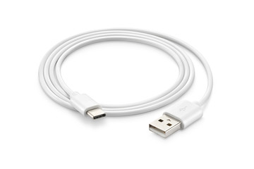 A white USB type C charger cable, compatible for many devices, wrapped in a spiral shape, isolated...