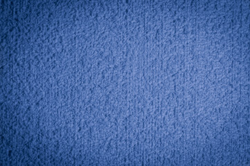 textured fabric trendy denim surface for background and wallpaper with dark vignetting gradient