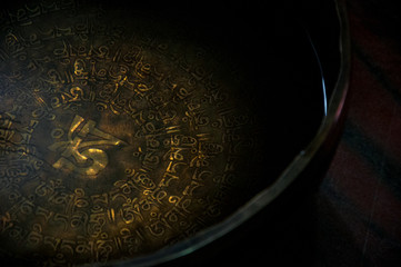 Singing bowl filled with water