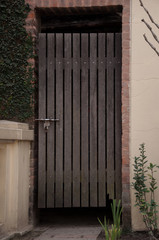 Closed old wooden garden door