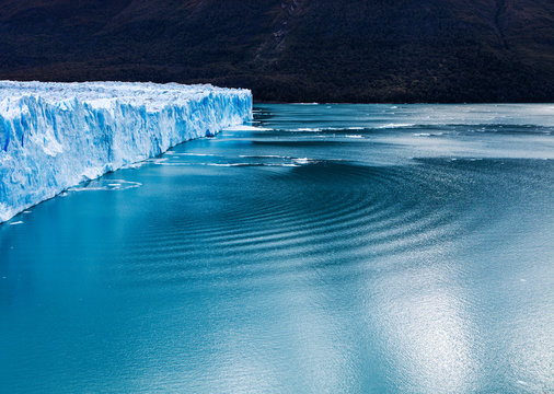 Big wave created by a collapsing ice stack from the Glacier. Perito Moreno Glacier, Los Glaciares National Park, UNESCO World Heritage Site, Patagonia, Argentina, South Amer