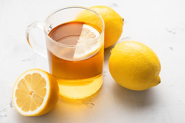Alternative medicine, natural home remedy for cold and flu. Hot herbal tea with lemon