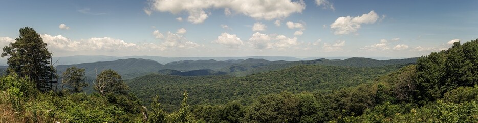 Fototapeta na wymiar Panorama view of hills in nature with forest in Shenandoah at sunny day