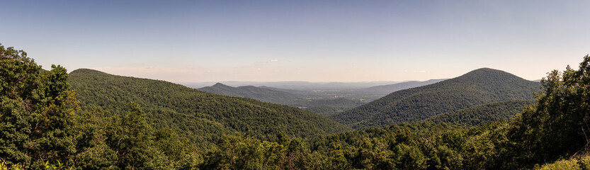 Fototapeta na wymiar Panorama view of hills in nature with forest in Shenandoah at sunny day