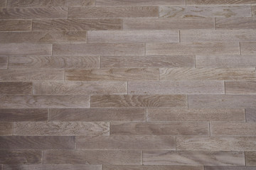 Obraz premium Natural wooden texture. New oak parquet. Wooden laminate floor boards background image. Polished oak pattern.