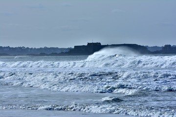 Big waves on the beach at Saint-Malo in Brittany. France