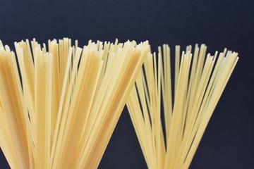 Italian long pasta, on dark background