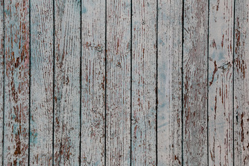 Fototapeta premium Old painted wooden fence. Background texture.