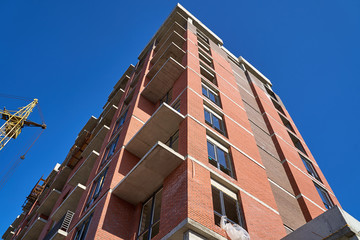 Construction site. High rise Building under construction. Construction of high-rise residential building