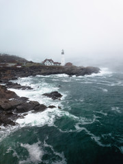 Fog Covered Lighthouse on the Coast of Maine
