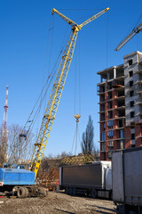 Construction site. High rise Building under construction. Construction of high-rise residential building