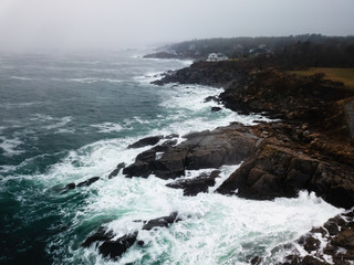 Obraz premium Fog Covered Lighthouse on the Coast of Maine